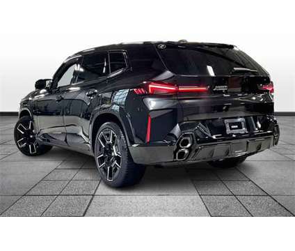 2024 BMW XM Base is a Black 2024 SUV in Grand Blanc MI