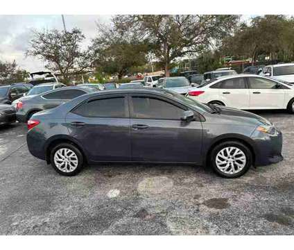 2018 Toyota Corolla for sale is a Blue 2018 Toyota Corolla Car for Sale in West Park FL