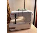 Janome New Home cover stitch sewing machine