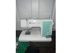 singer confidence sewing machine - included all items in the photo