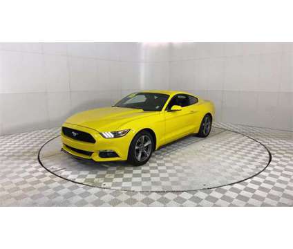 2016 Ford Mustang V6 is a Yellow 2016 Ford Mustang V6 Coupe in Southfield MI