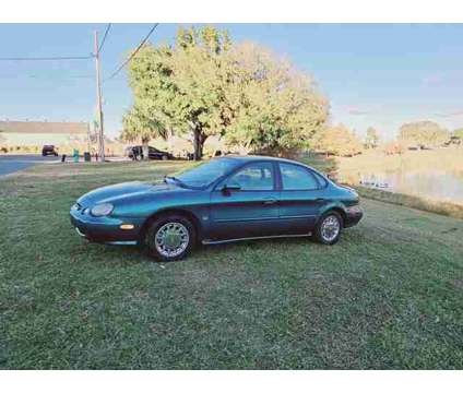 1998 Ford Taurus for sale is a Green 1998 Ford Taurus Car for Sale in Haines City FL