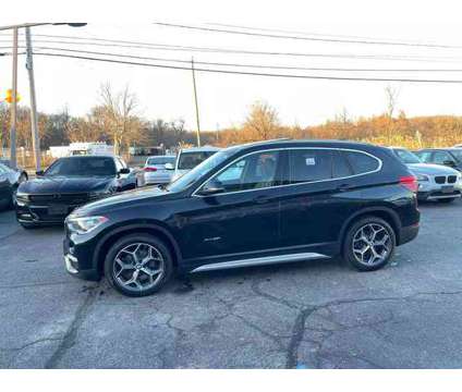 2017 BMW X1 for sale is a Black 2017 BMW X1 Car for Sale in East Providence RI