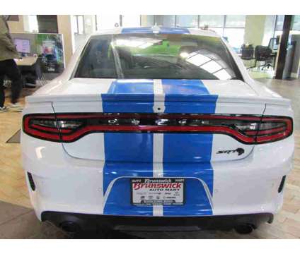 2023NewDodgeNewCharger is a White 2023 Dodge Charger Car for Sale in Brunswick OH