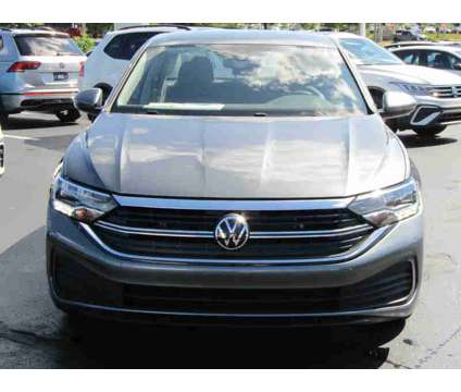 2024NewVolkswagenNewJettaNewAuto is a Grey, Silver 2024 Volkswagen Jetta Car for Sale in Brunswick OH