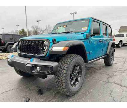 2024 Jeep Wrangler 4xe Willys is a White 2024 Jeep Wrangler Car for Sale in Pataskala OH