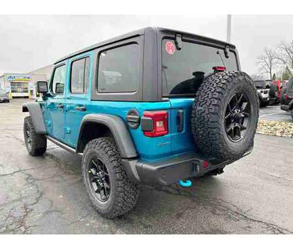 2024 Jeep Wrangler 4xe Willys is a White 2024 Jeep Wrangler Car for Sale in Pataskala OH