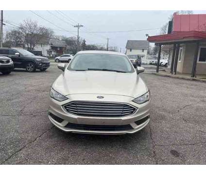 2018 Ford Fusion for sale is a Gold 2018 Ford Fusion Car for Sale in Akron OH