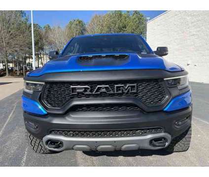 2024 Ram 1500 TRX is a Blue 2024 RAM 1500 Model Truck in Wake Forest NC