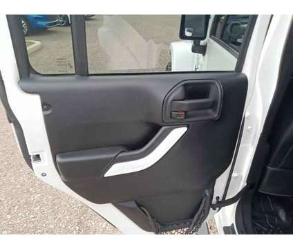 2013 Jeep Wrangler Unlimited Freedom Edition is a White 2013 Jeep Wrangler Unlimited SUV in Cottonwood AZ