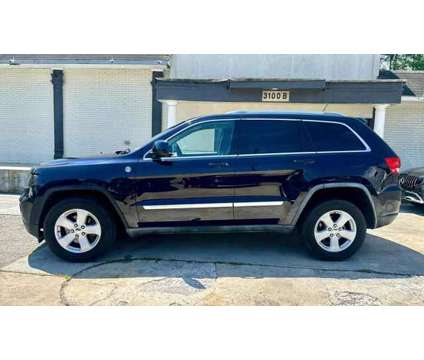2011 Jeep Grand Cherokee for sale is a Blue 2011 Jeep grand cherokee Car for Sale in Charlotte NC
