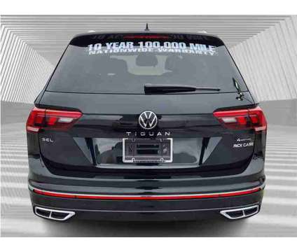 2024 Volkswagen Tiguan 2.0T SEL R-Line is a Black 2024 Volkswagen Tiguan 2.0T SEL SUV in Fort Lauderdale FL