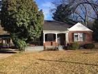 We have a freshly painted two story brick home.