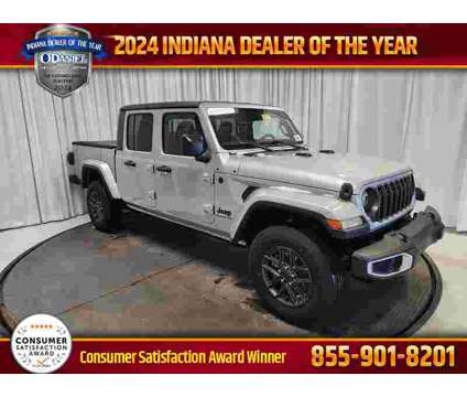 2024 Jeep Gladiator Sport is a Silver 2024 Sport Truck in Fort Wayne IN