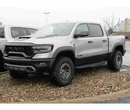 2024NewRamNew1500New4x4 Crew Cab 5 7 Box is a Silver 2024 RAM 1500 Model Car for Sale in Brunswick OH