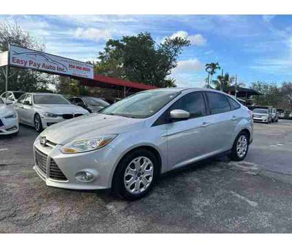 2012 Ford Focus for sale is a Silver 2012 Ford Focus Car for Sale in West Park FL