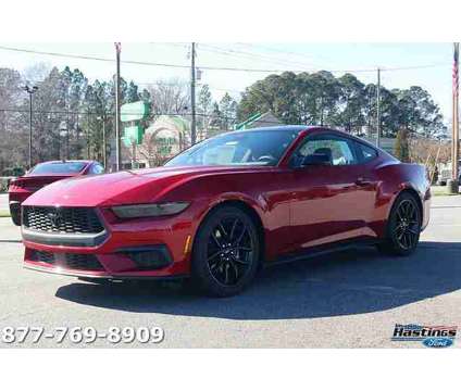 2024 Ford Mustang EcoBoost Premium is a Red 2024 Ford Mustang EcoBoost Premium Coupe in Greenville NC