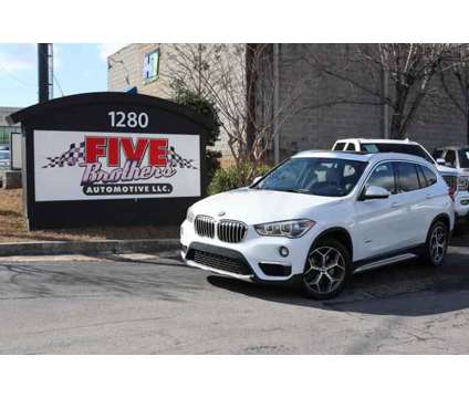 2017 BMW X1 for sale is a White 2017 BMW X1 Car for Sale in Roswell GA