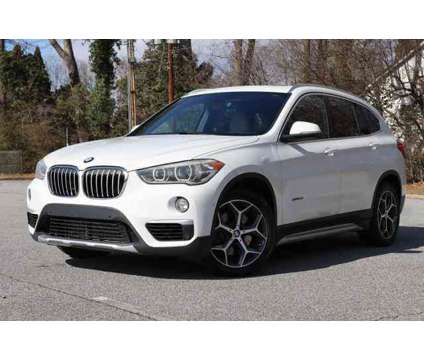 2017 BMW X1 for sale is a White 2017 BMW X1 Car for Sale in Roswell GA