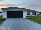Ranch, One Story, Single Family Residence - CAPE CORAL, FL 636 Ne 2nd Pl