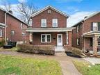 Welcome to this all brick 2 bed, 1.1 baths withinwalking distance to shopping
