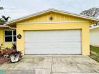 400 NW 34th St, Oakland Park, FL 33309