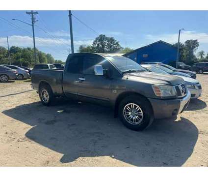 2004 Nissan Titan King Cab for sale is a Grey 2004 Nissan Titan King Cab Car for Sale in Fayetteville NC