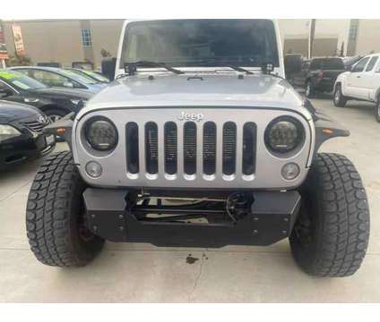 2012 Jeep Wrangler for sale is a Silver 2012 Jeep Wrangler Car for Sale in Bloomington CA