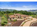 Perched near the top of the exclusive gated Monte Sereno Estates