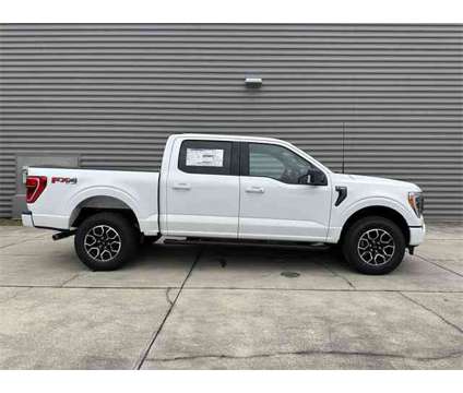2023 Ford F-150 XLT is a White 2023 Ford F-150 XLT Truck in Gainesville FL