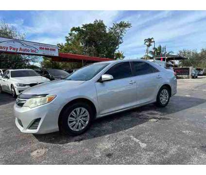 2014 Toyota Camry for sale is a Silver 2014 Toyota Camry Car for Sale in West Park FL