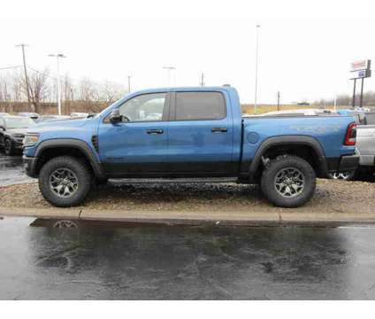 2024NewRamNew1500New4x4 Crew Cab 5 7 Box is a Blue 2024 RAM 1500 Model Car for Sale in Brunswick OH