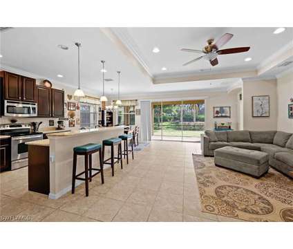 Gated community, Community pool at 12880 Seaside Key Ct in Fort Myers FL is a Single-Family Home