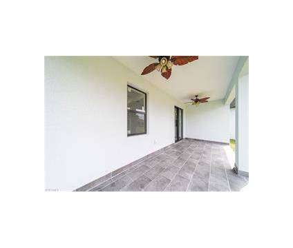 New construction, Home office, spacious outdoor lanai in Fort Myers FL is a Single-Family Home