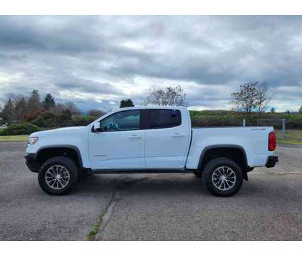 2018UsedChevroletUsedColoradoUsedCrew Cab 128.3 is a White 2018 Chevrolet Colorado Car for Sale in Medford OR