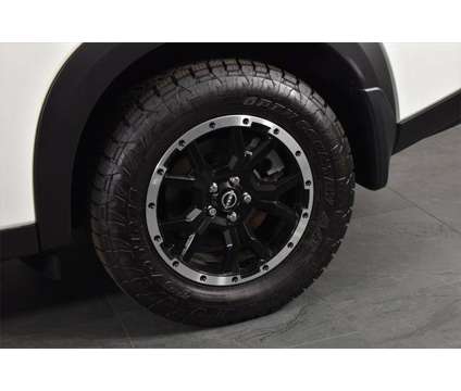 2024 Nissan Pathfinder Rock Creek 4WD is a White 2024 Nissan Pathfinder SUV in Orlando FL