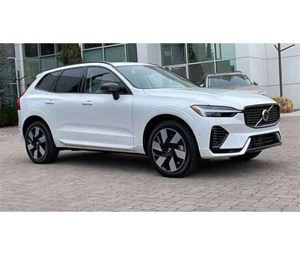 2024 Volvo XC60 Recharge Plug-In Hybrid Plus Dark Theme is a White 2024 Volvo XC60 3.2 Trim Hybrid in Reno NV