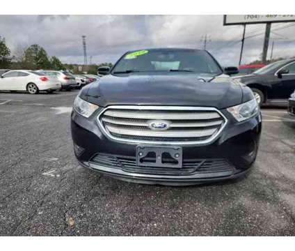 2015 Ford Taurus for sale is a Black 2015 Ford Taurus Car for Sale in Monroe NC
