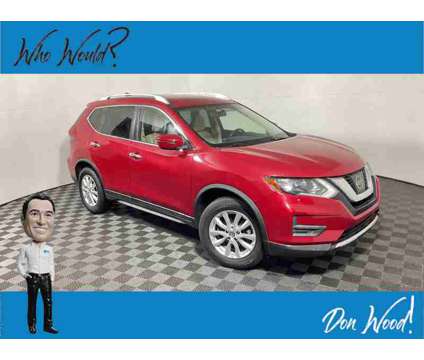 2017 Nissan Rogue SV is a Red 2017 Nissan Rogue SV SUV in Athens OH
