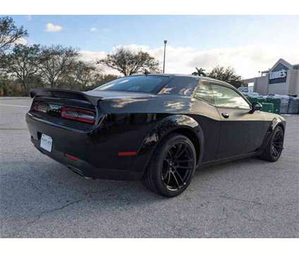 2023 Dodge Challenger R/T Scat Pack Widebody is a Black 2023 Dodge Challenger R/T Scat Pack Coupe in Naples FL