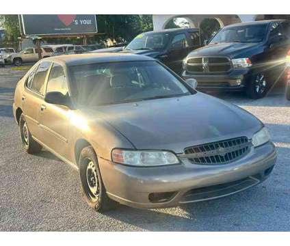 2000 Nissan Altima for sale is a Brown 2000 Nissan Altima 2.5 Trim Car for Sale in Haines City FL