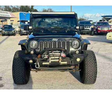 2013 Jeep Wrangler for sale is a Black 2013 Jeep Wrangler Car for Sale in Haines City FL
