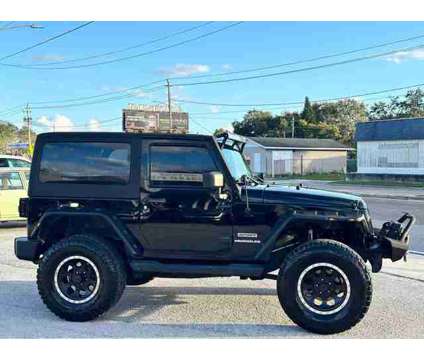 2013 Jeep Wrangler for sale is a Black 2013 Jeep Wrangler Car for Sale in Haines City FL