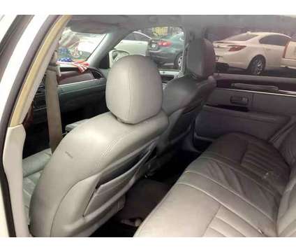 2004 Lincoln Town Car for sale is a White 2004 Lincoln Town Car Car for Sale in Houston TX