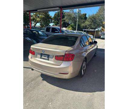 2015 BMW 3 Series for sale is a Gold 2015 BMW 3-Series Car for Sale in Hialeah FL