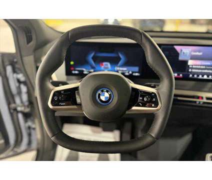 2024 BMW iX xDrive50 is a 2024 BMW 325 Model iX SUV in Shrewsbury MA