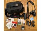 Canon EOS Rebel XS 1000D SLR Camera Bundle- 2 Lenses, Case and Accessories