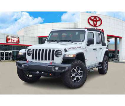 2019 Jeep Wrangler Unlimited Rubicon is a White 2019 Jeep Wrangler Unlimited Rubicon SUV in Katy TX