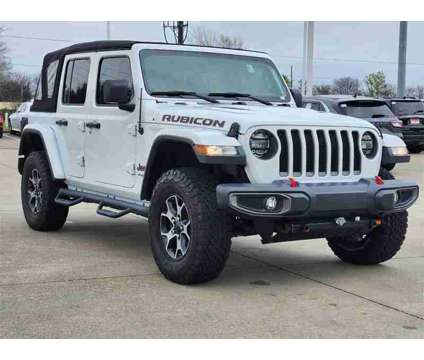 2019 Jeep Wrangler Unlimited Rubicon is a White 2019 Jeep Wrangler Unlimited Rubicon SUV in Katy TX