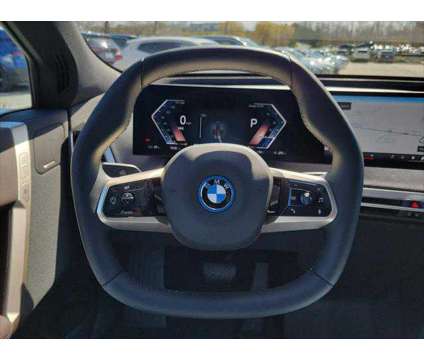 2024 BMW iX xDrive50 is a Grey 2024 BMW 325 Model iX SUV in Newton NJ